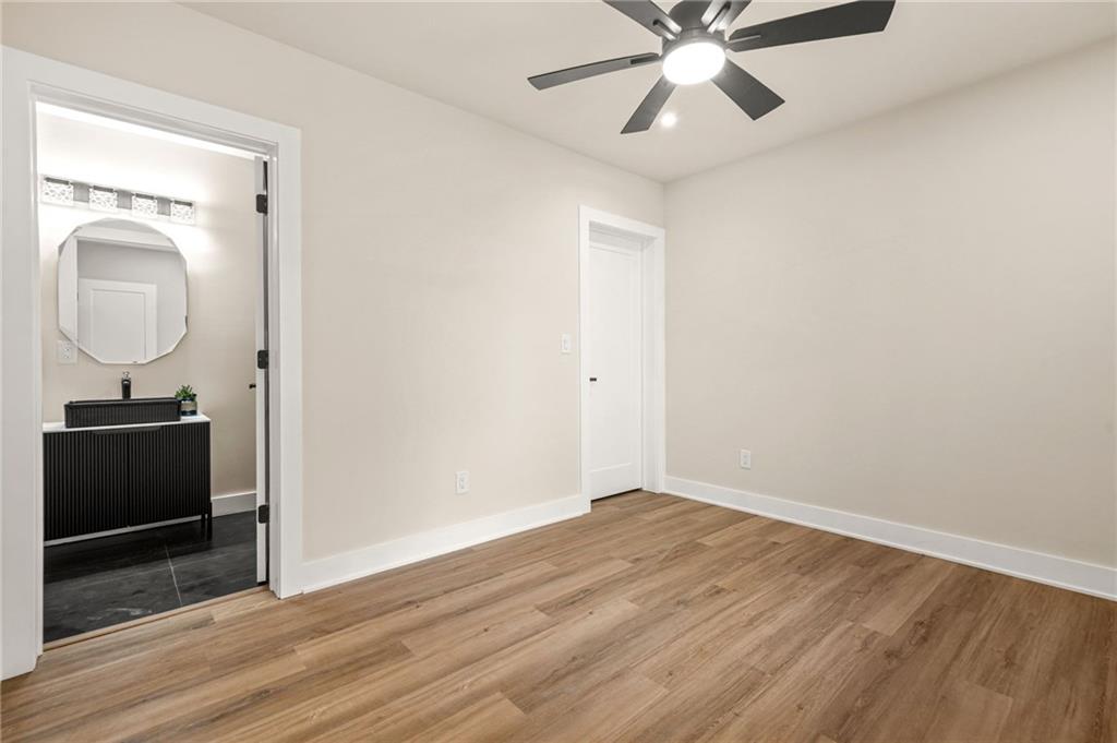 237 Altoona Place Southwest Atlanta, GA 30314 - Photo 54 of 63 a view of a livingroom with a sink and wooden floor