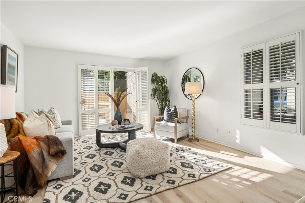 126 Clearbrook Irvine, CA 92614 - Photo 2 of 44 a living room with furniture and a large window