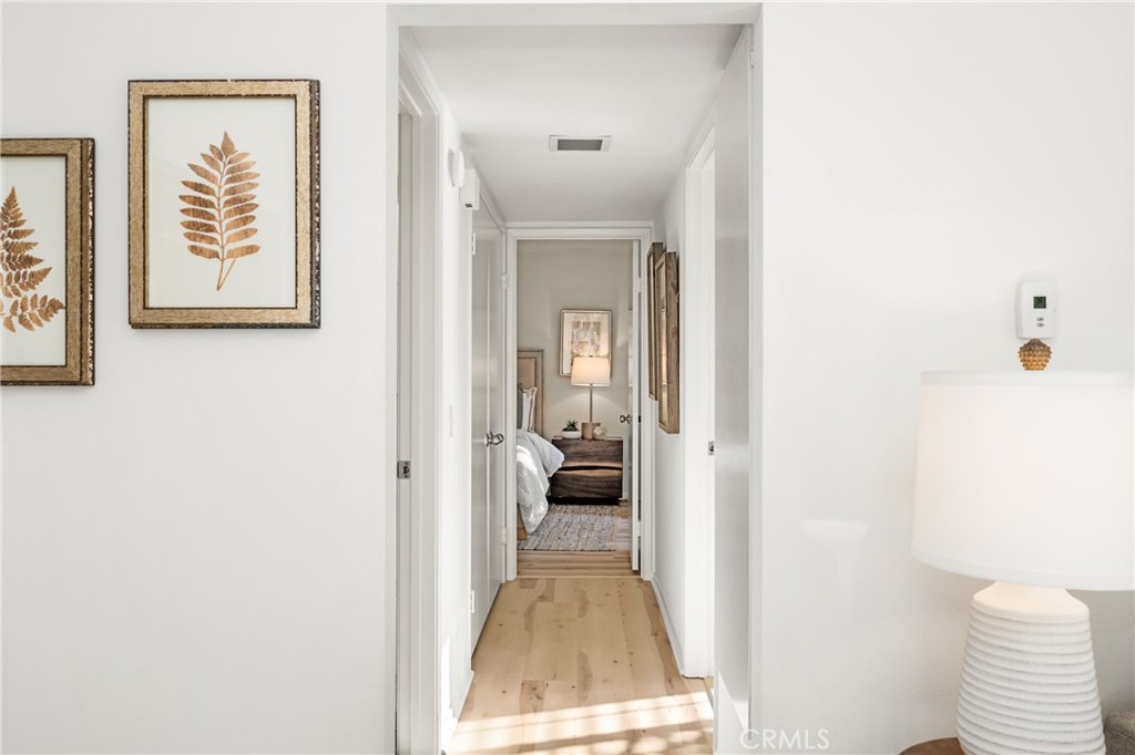 126 Clearbrook Irvine, CA 92614 - Photo 22 of 44 a view of a hallway with a living room