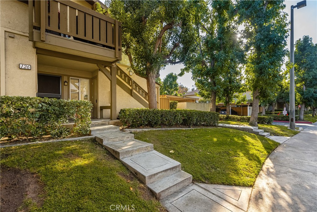 126 Clearbrook Irvine, CA 92614 - Photo 24 of 44 a view of a house with pool and sitting area