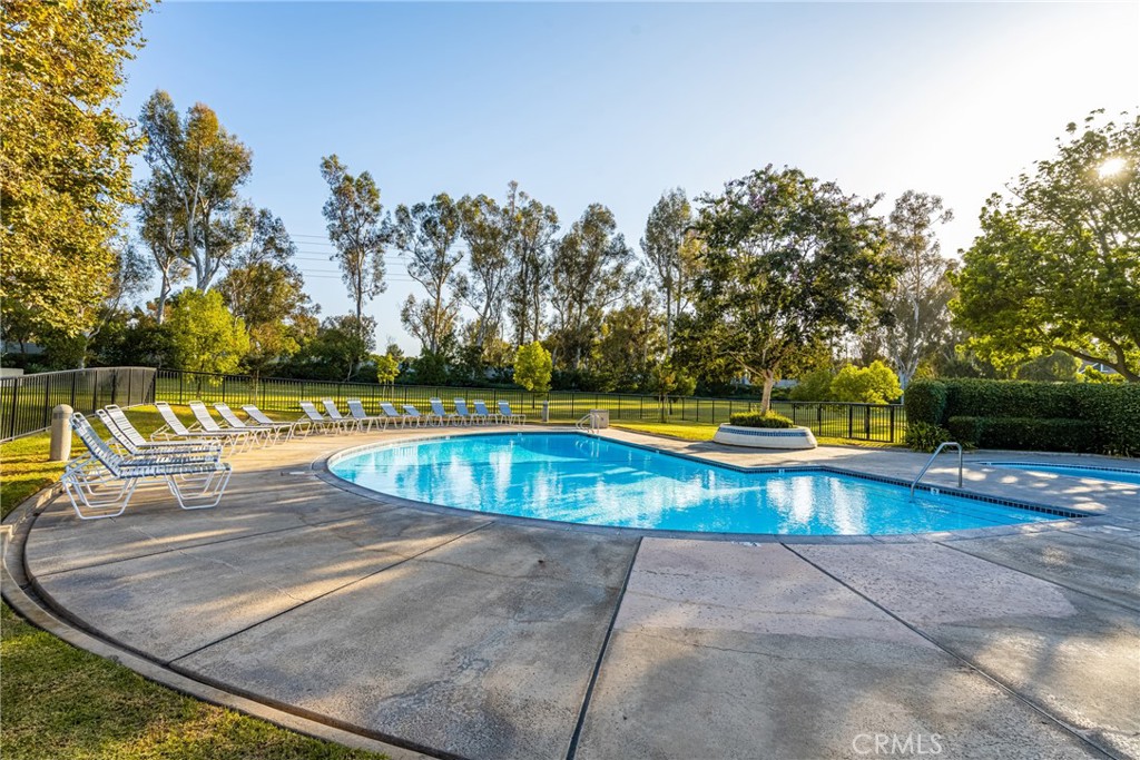 126 Clearbrook Irvine, CA 92614 - Photo 26 of 44 a view of a swimming pool with an outdoor space and seating area