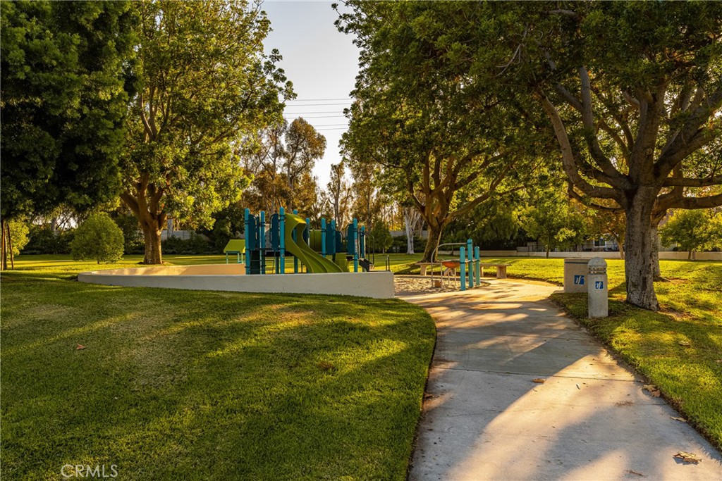 126 Clearbrook Irvine, CA 92614 - Photo 27 of 44 a view of swimming pool with large trees and a big yard