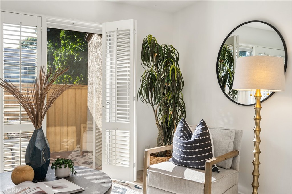 126 Clearbrook Irvine, CA 92614 - Photo 3 of 44 a view of a entryway door with wooden floor