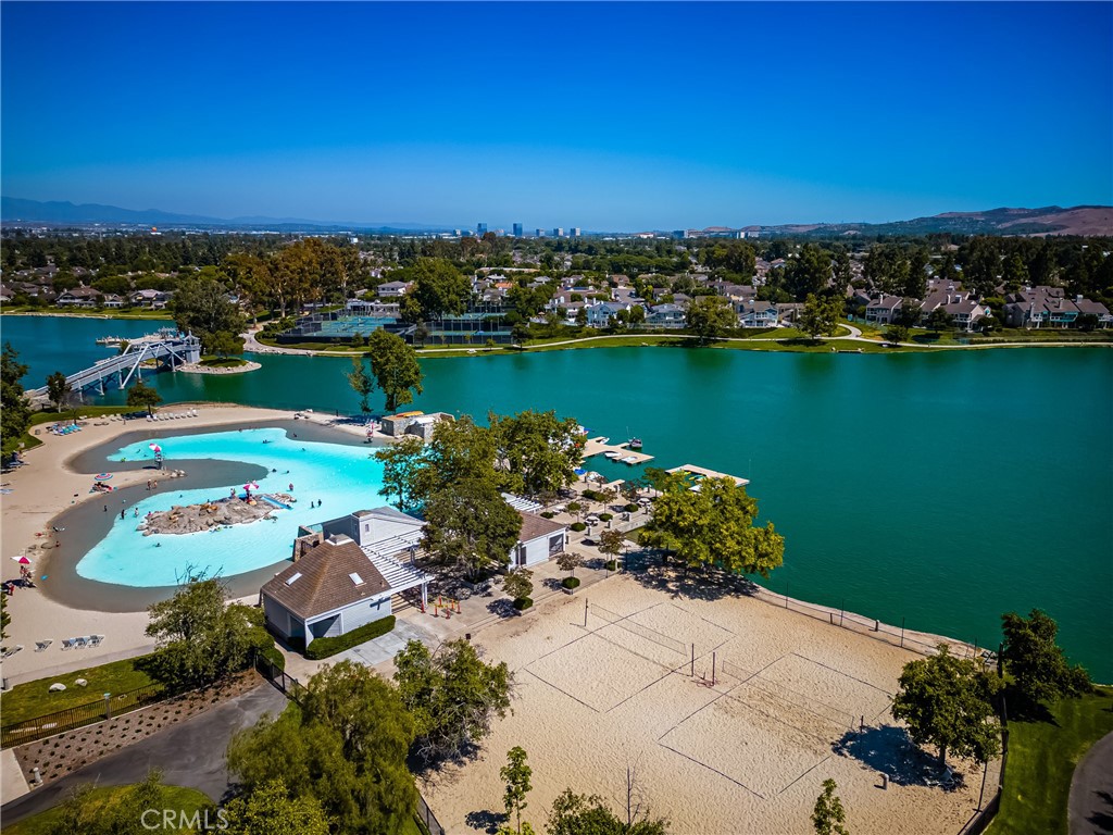 126 Clearbrook Irvine, CA 92614 - Photo 38 of 44 an aerial view of a house with a lake view