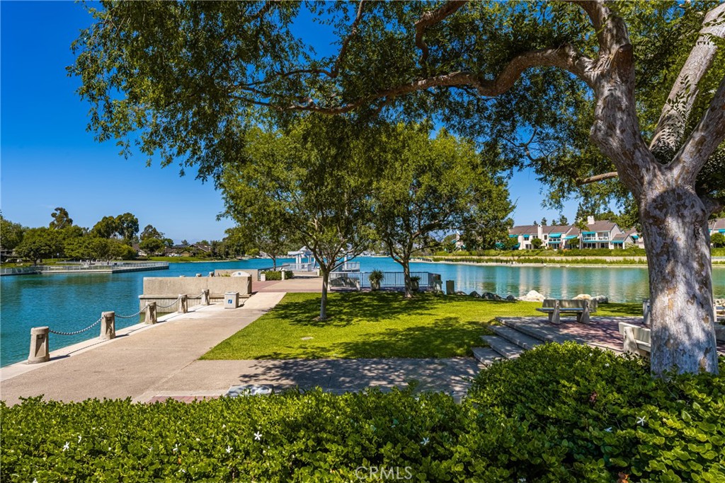 126 Clearbrook Irvine, CA 92614 - Photo 43 of 44 a view of a lake with houses and trees around