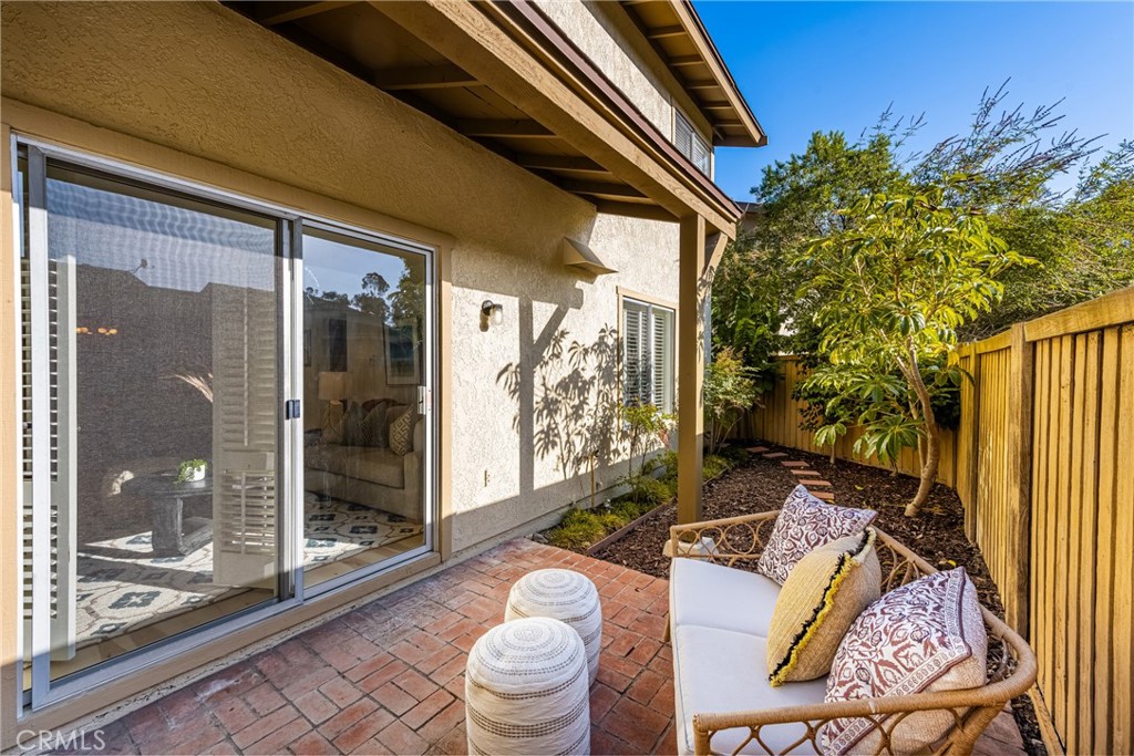 126 Clearbrook Irvine, CA 92614 - Photo 5 of 44 a outdoor space view with a couple of couches and potted plants