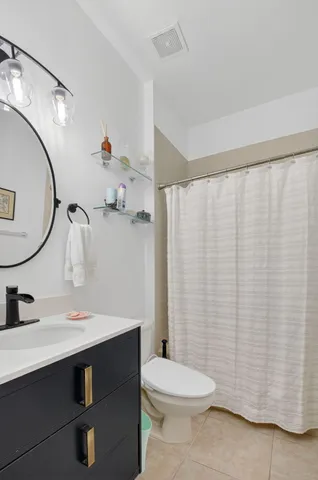 a garden with trees in the background