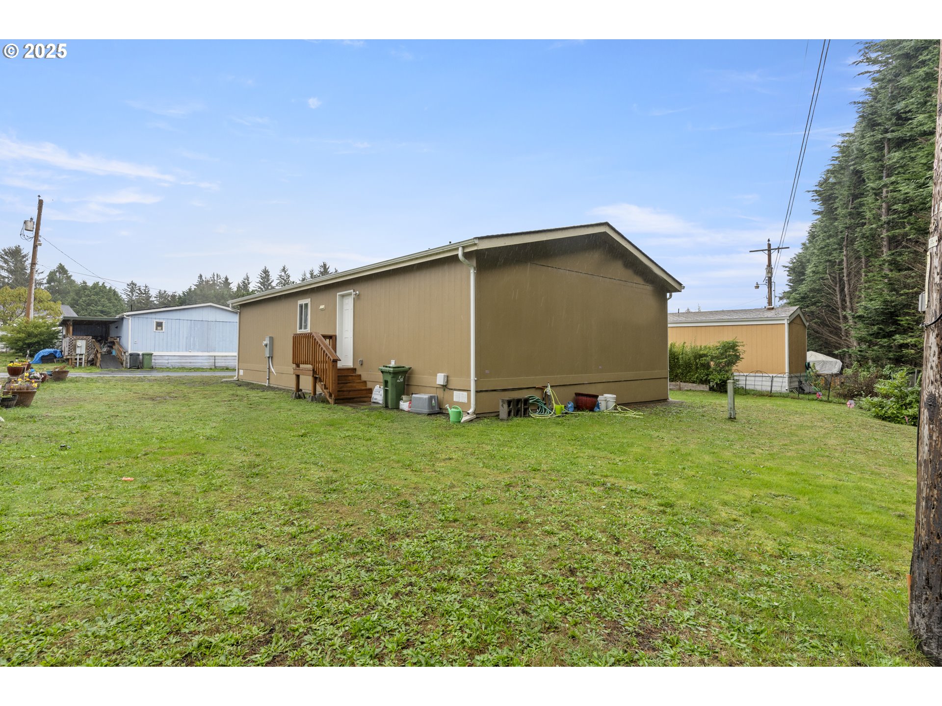 69127 Wildwood Road, Unit 4 North Bend, OR 97459 - Photo 20 of 20 a backyard of a house with lots of green space