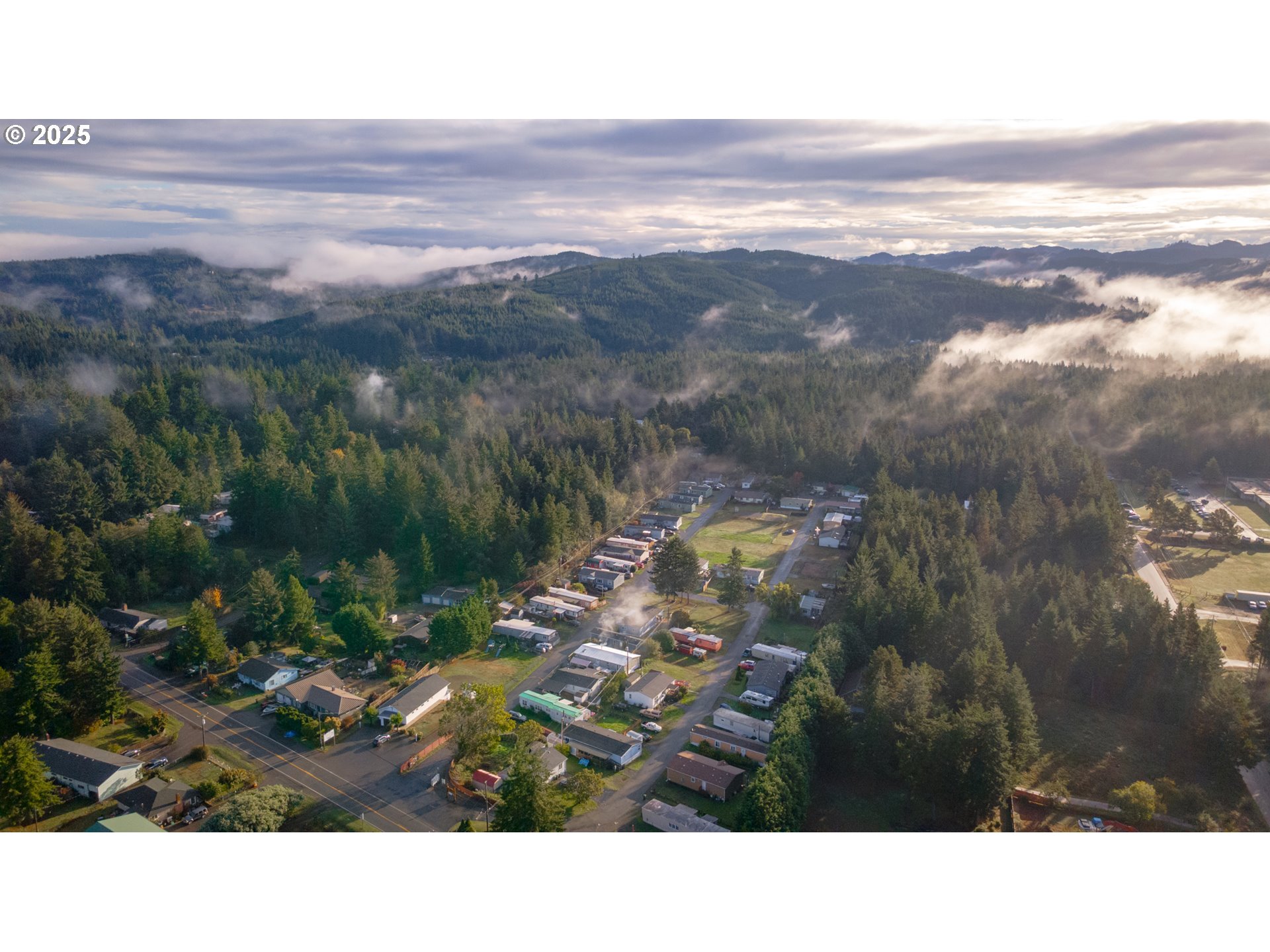 69127 Wildwood Road, Unit 4 North Bend, OR 97459 - Photo 5 of 20 a black and white photo of a lake