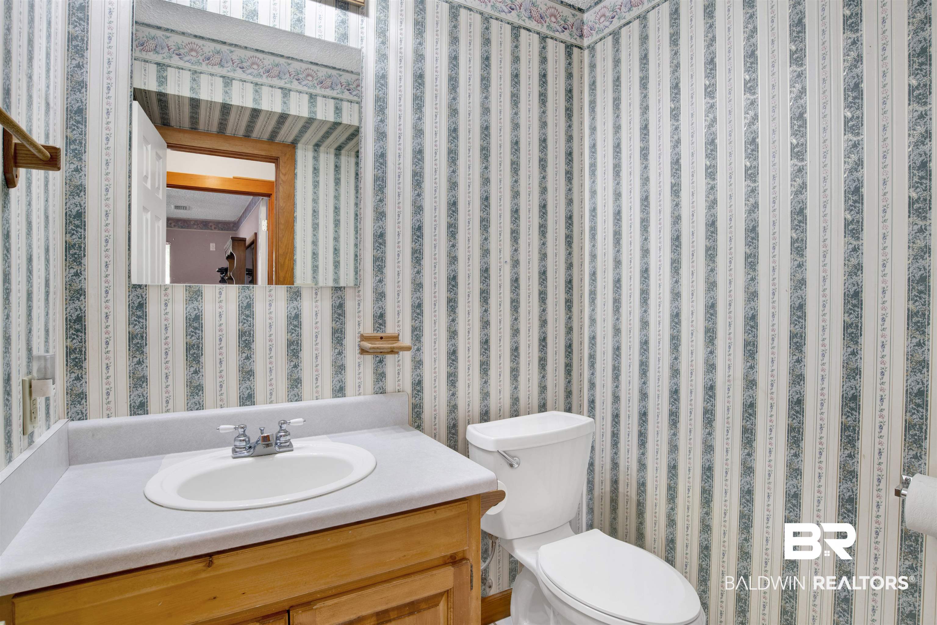 4890 Red Creek Road Semmes, AL 36575 - Photo 16 of 47 Bathroom with vanity and toilet
