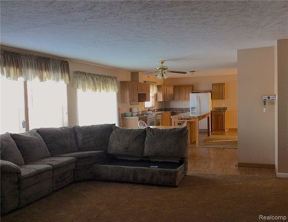 FAMILY ROOM OPEN TO THE KITCHEN