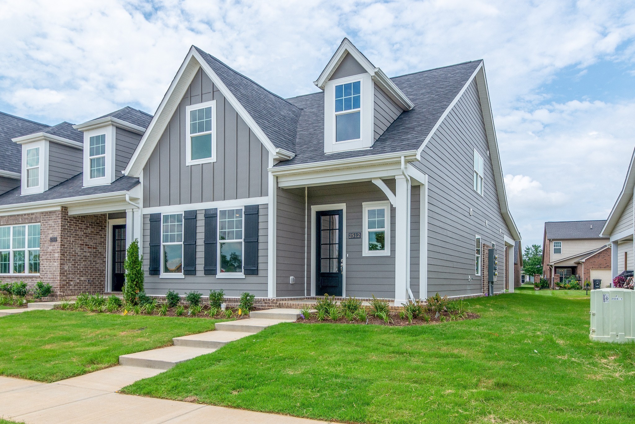 3122 Arbor Valley Rd Spring Hill, Unit C 8 F Spring Hill, TN 37174 - Photo 2 of 18 front view of a house with a yard