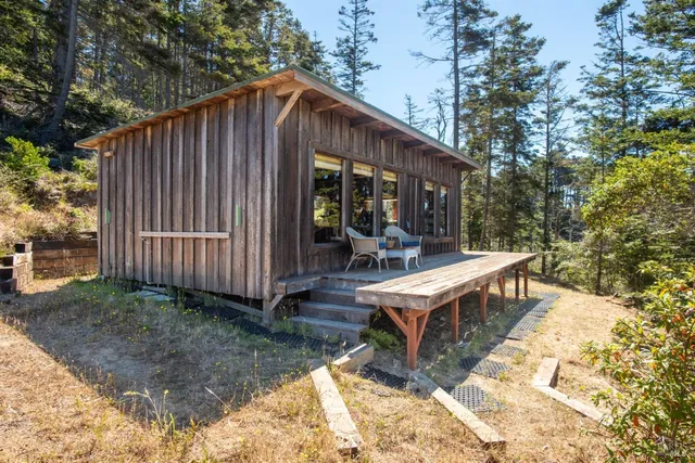 a view of a chairs and table in the patio