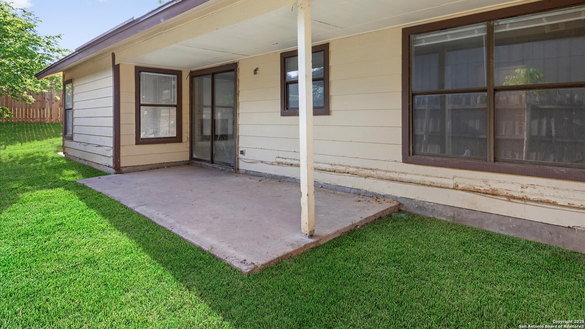 8622 Ridge Flower San Antonio, TX 78239 - Photo 15 of 19 front view of house with a yard