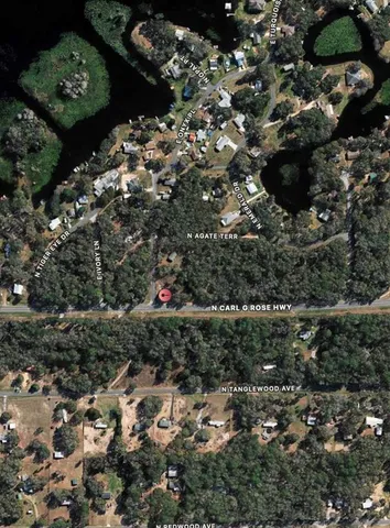 a view of a street with a bench