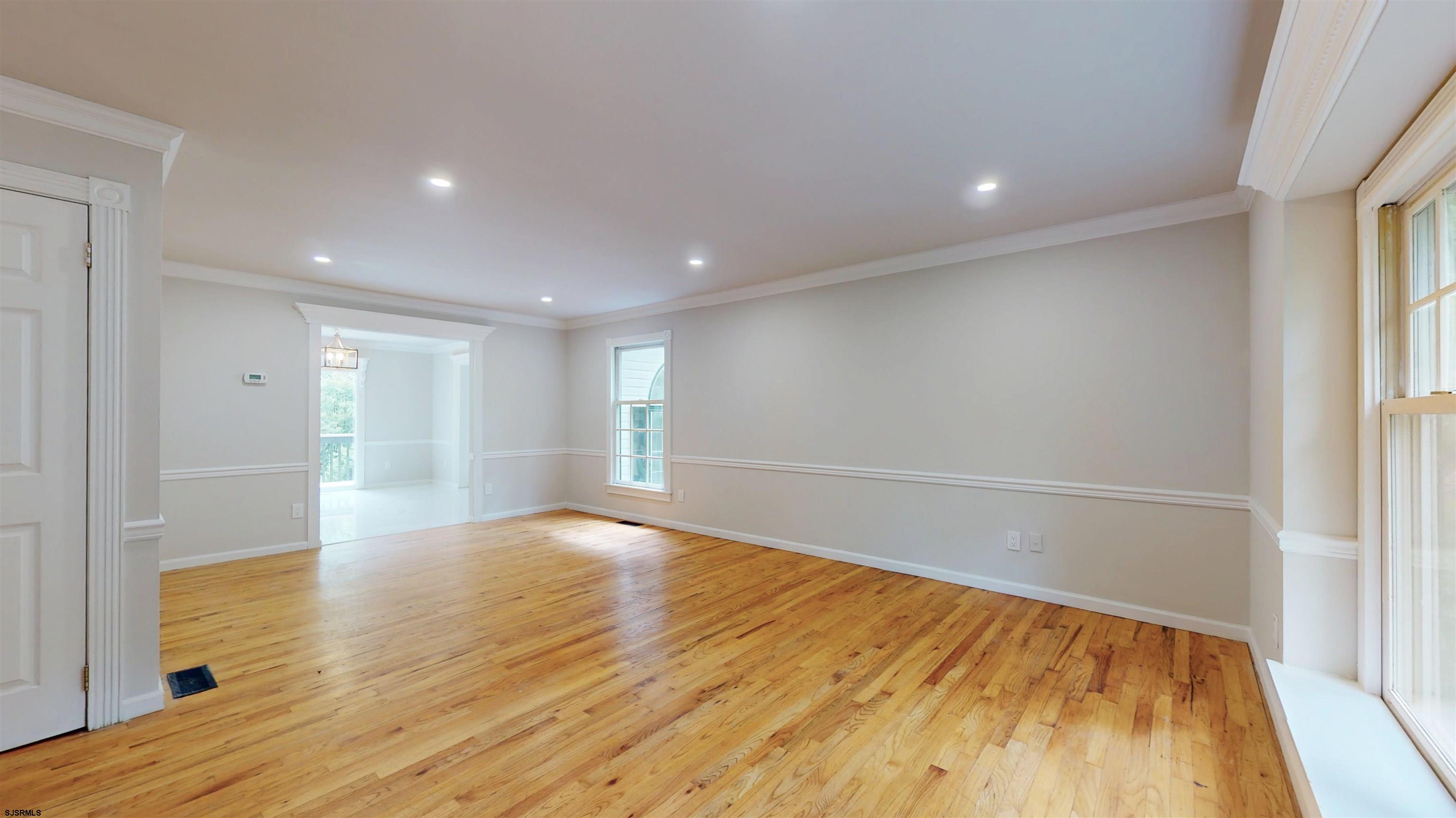 254 West Cologne Port Republic Road Egg Harbor City, NJ 08215 - Photo 26 of 81 a view of an empty room and wooden floor