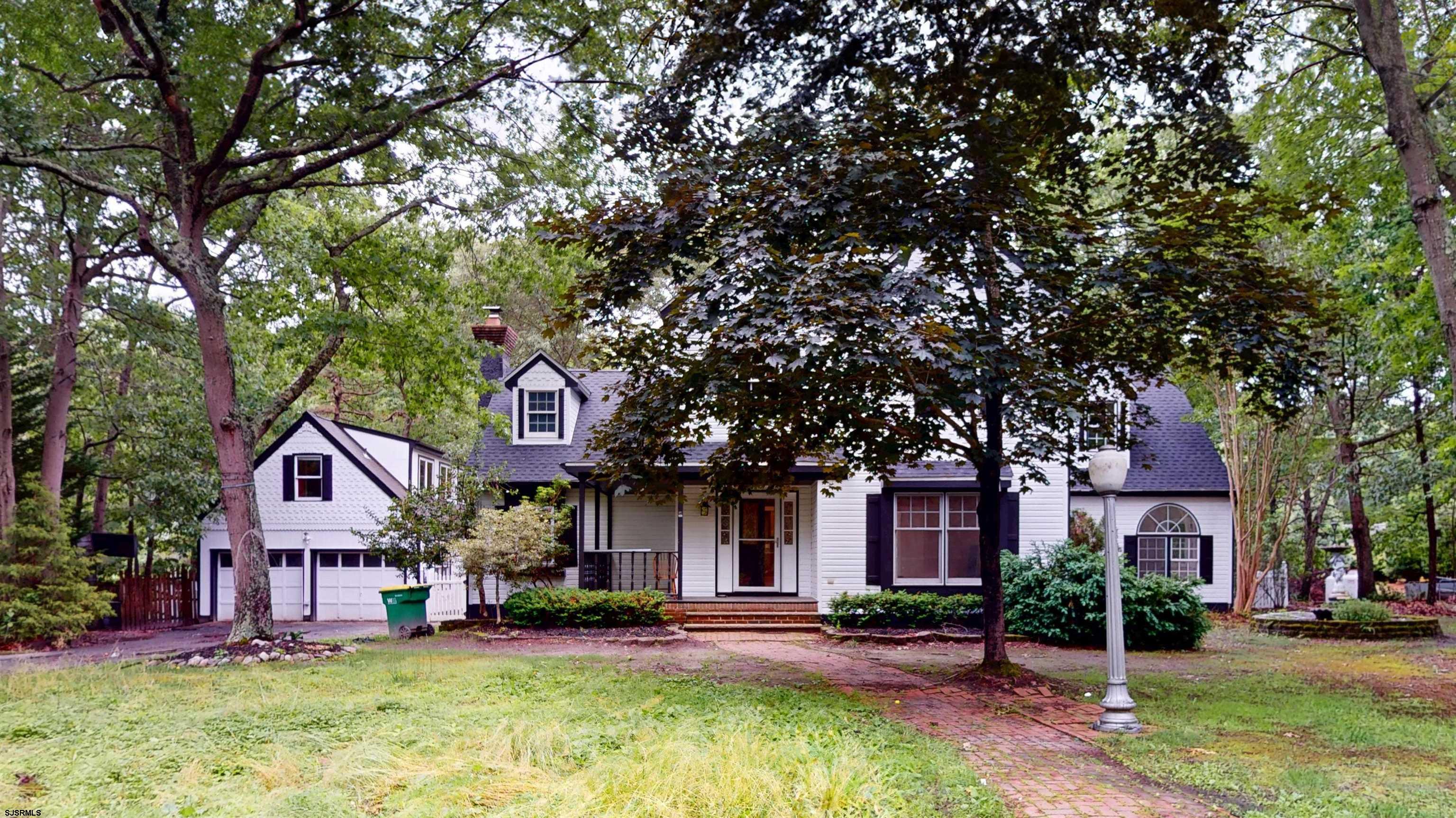 254 West Cologne Port Republic Road Egg Harbor City, NJ 08215 - Photo 3 of 81 a front view of a houses with yard and green space