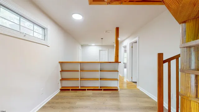 a house with trees in the background