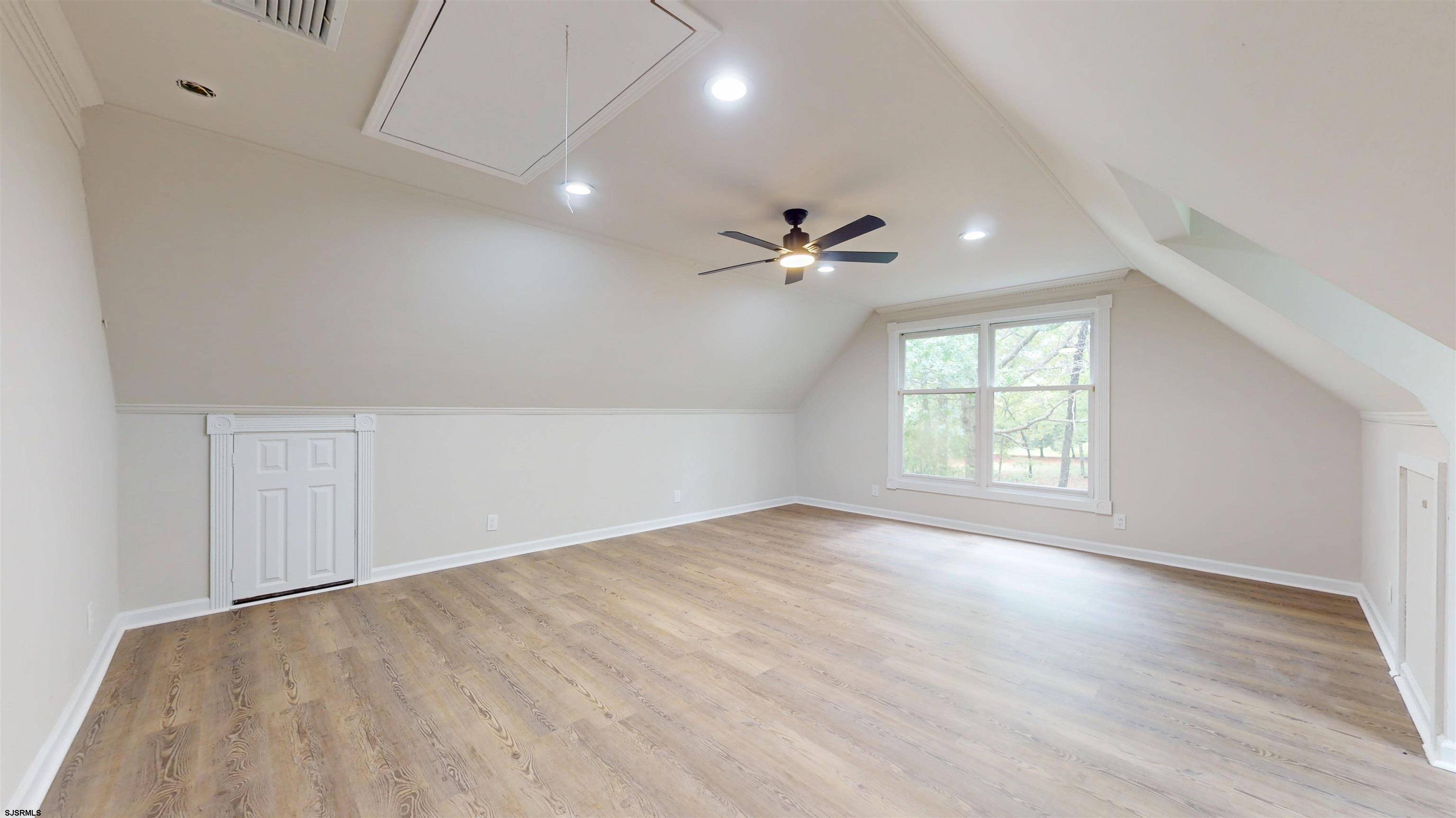 254 West Cologne Port Republic Road Egg Harbor City, NJ 08215 - Photo 42 of 81 wooden floor in an empty room with a window