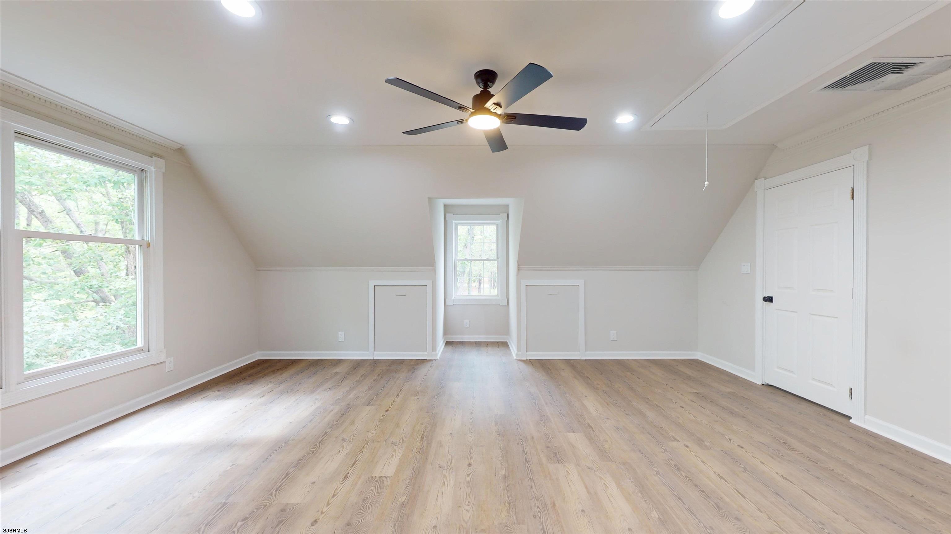 254 West Cologne Port Republic Road Egg Harbor City, NJ 08215 - Photo 43 of 81 a view of empty room with wooden floor and fan