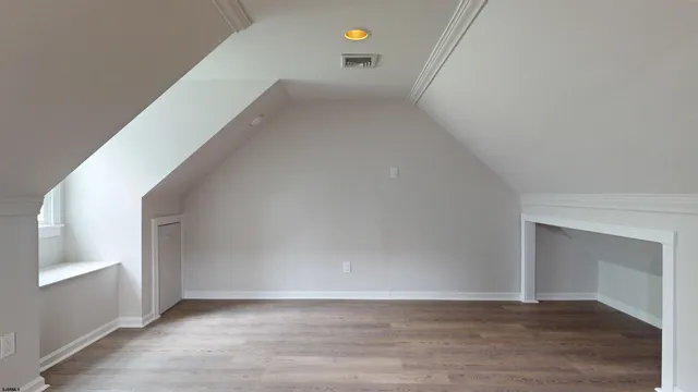 an aerial view of a house with outdoor space and street view