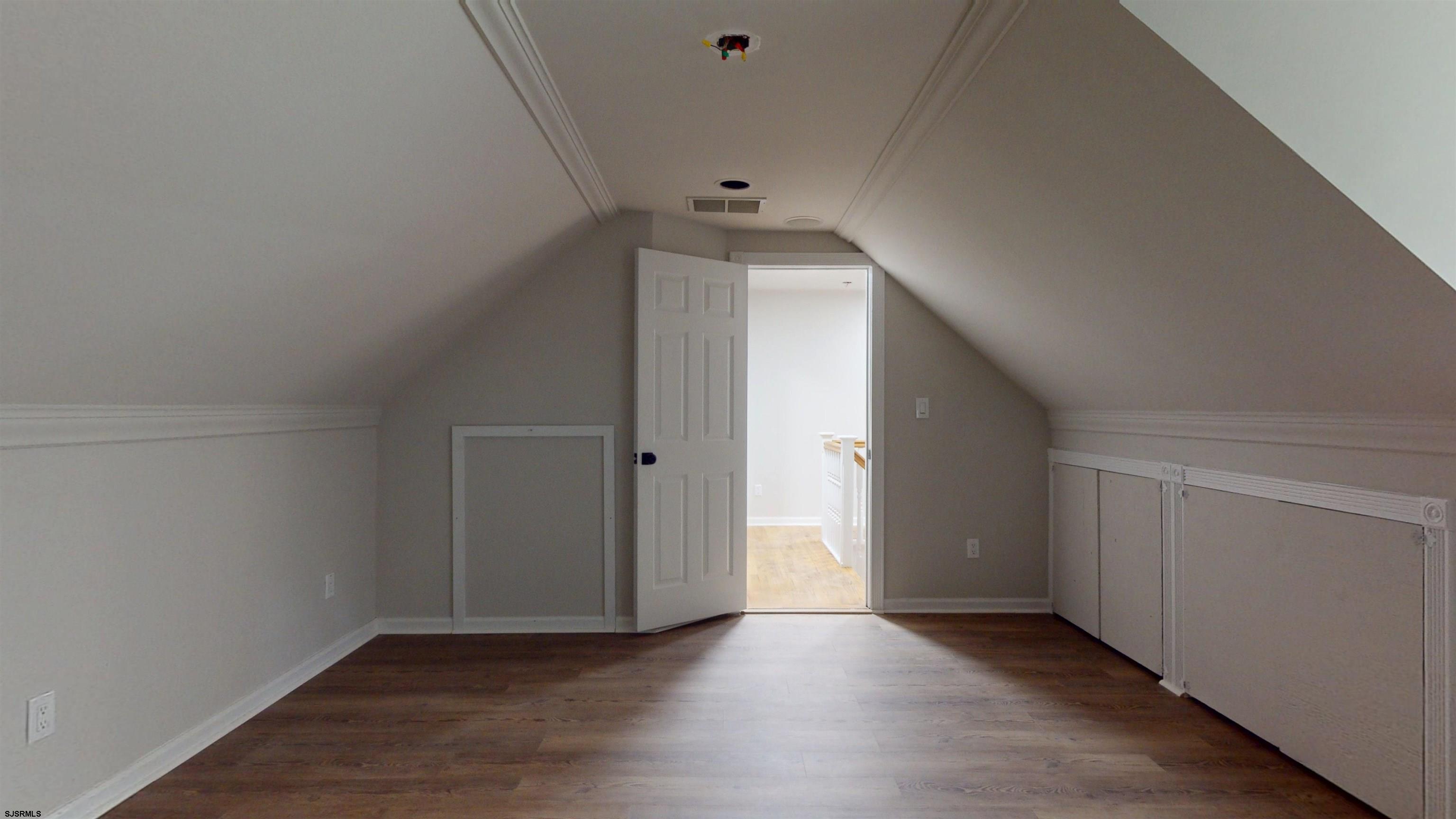 254 West Cologne Port Republic Road Egg Harbor City, NJ 08215 - Photo 48 of 81 a view of an empty room with wooden floor and closet