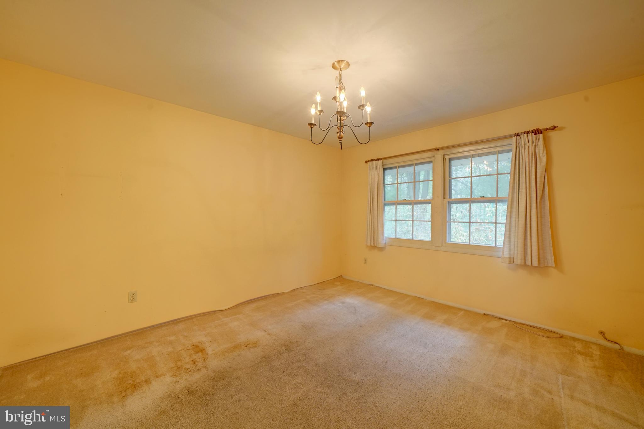 12310 Shadetree Lane Laurel, MD 20708 - Photo 12 of 54 Double window in the dining room out the rear