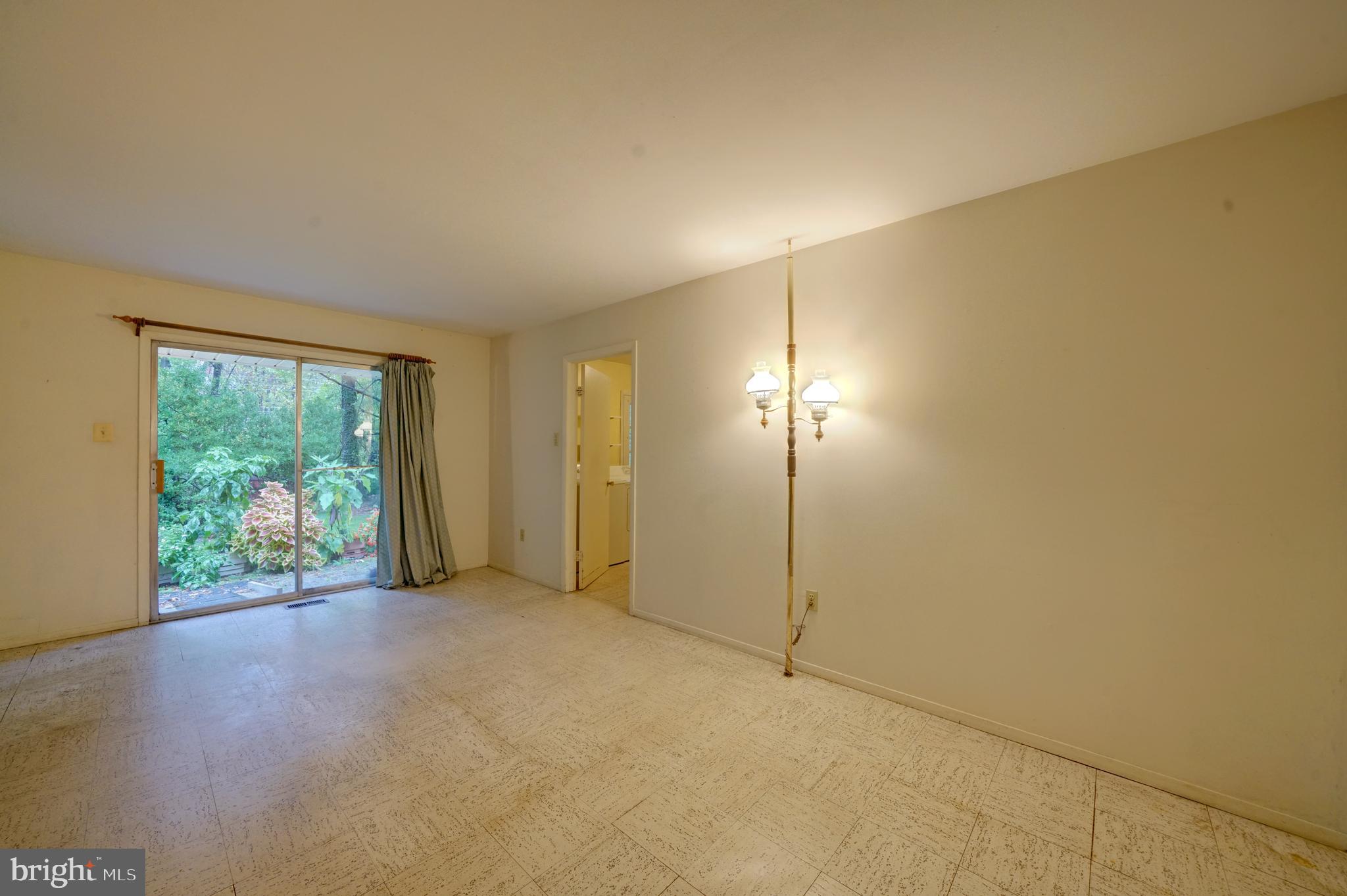 12310 Shadetree Lane Laurel, MD 20708 - Photo 20 of 54 Plenty of wall space in the family room