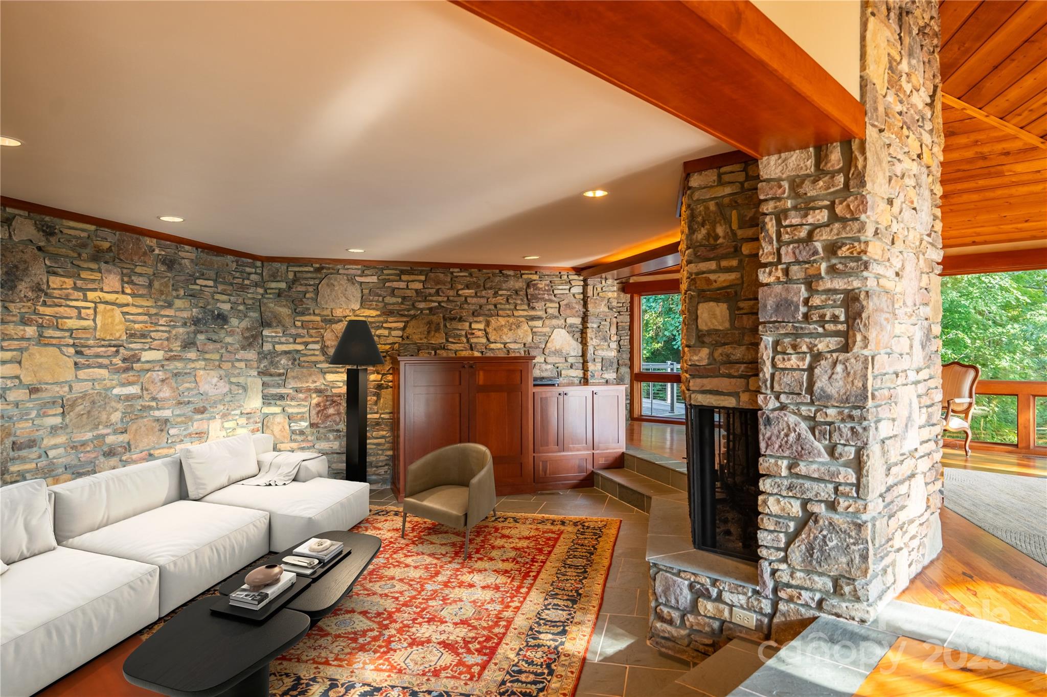 130 Piney Rdg Lane Saluda, NC 28773 - Photo 12 of 48 a living room with furniture a rug and a fireplace