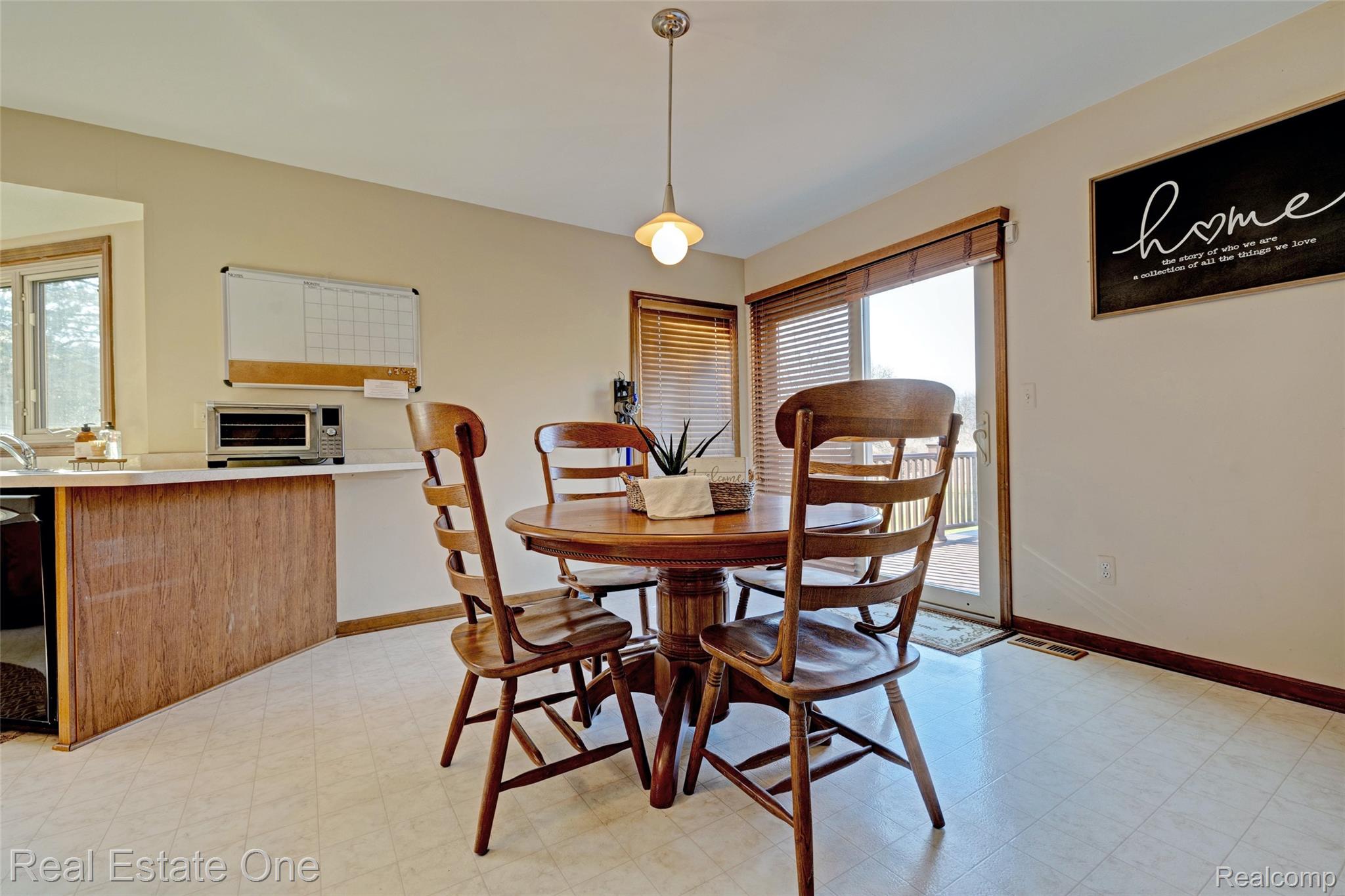 6400 Oakhill Road Ortonville, MI 48462 - Photo 19 of 82 Dining space with light floors and baseboards