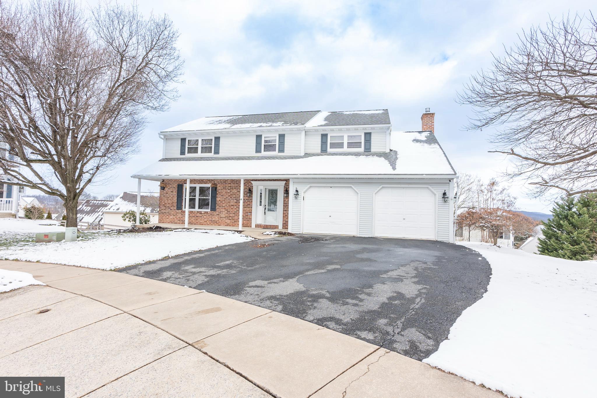 6 Overview Court Reading, PA 19607 - Photo 2 of 69 a front view of a house with a yard and garage