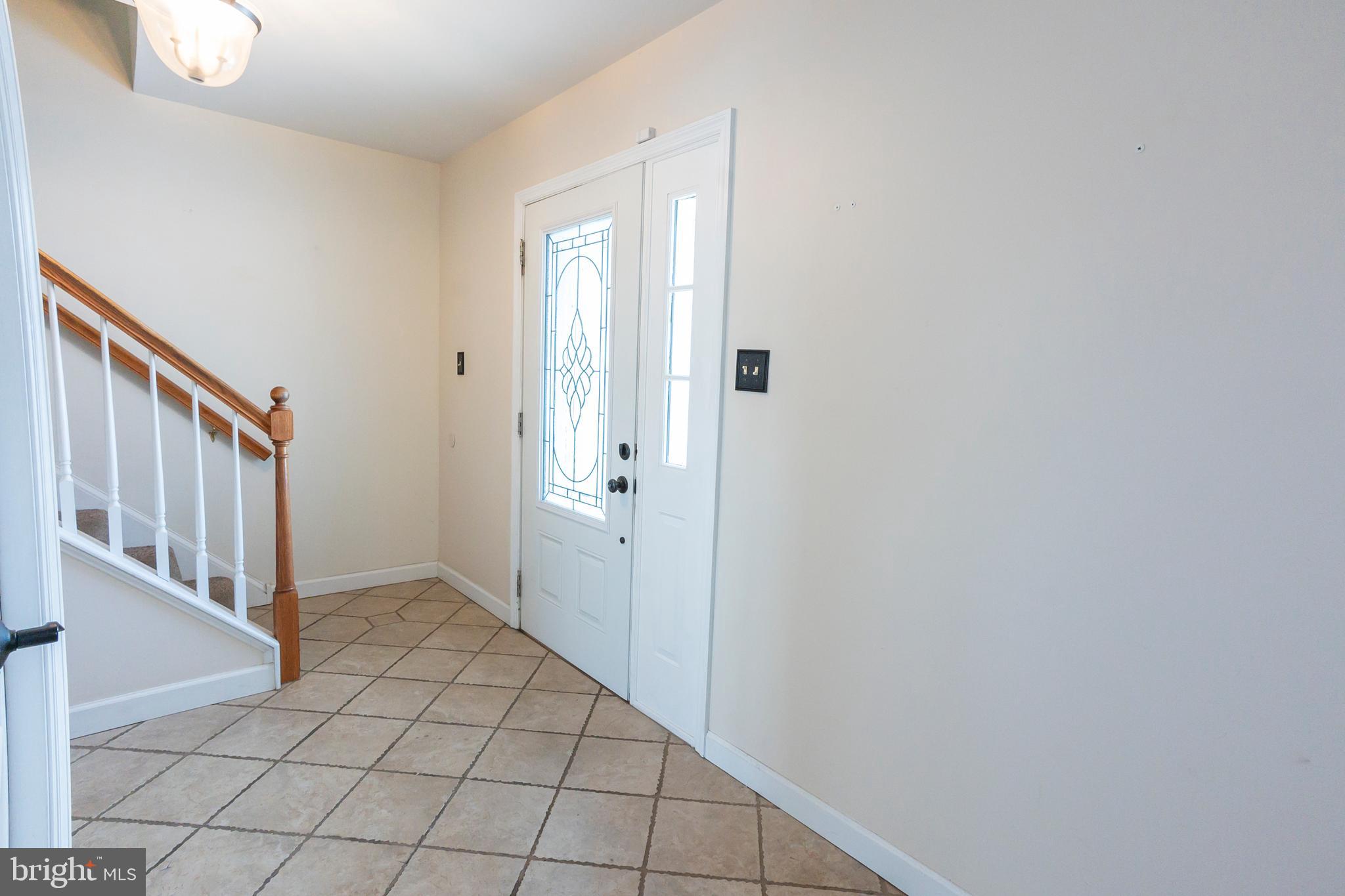 6 Overview Court Reading, PA 19607 - Photo 22 of 69 a view of an entryway with a staircase