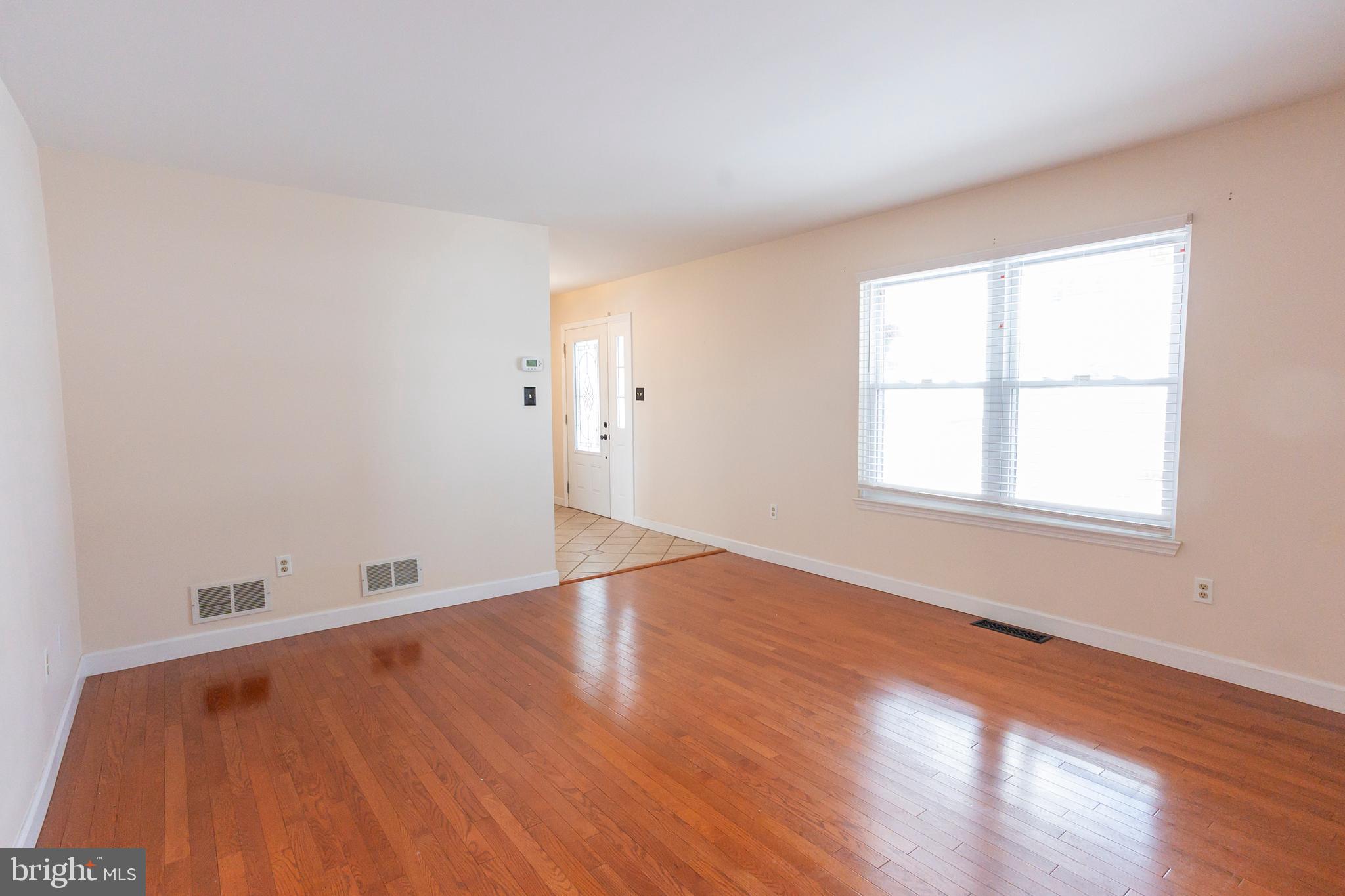 6 Overview Court Reading, PA 19607 - Photo 30 of 69 an empty room with wooden floor and windows