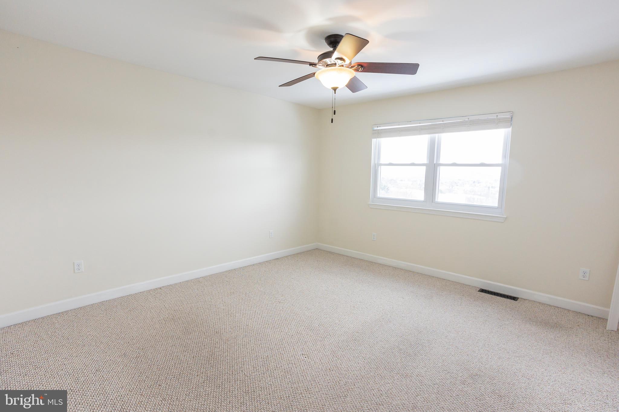 6 Overview Court Reading, PA 19607 - Photo 32 of 69 an empty room with a window and a fan