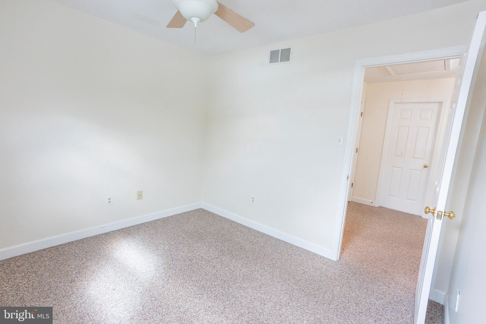 6 Overview Court Reading, PA 19607 - Photo 33 of 69 an empty room with a ceiling fan and a window
