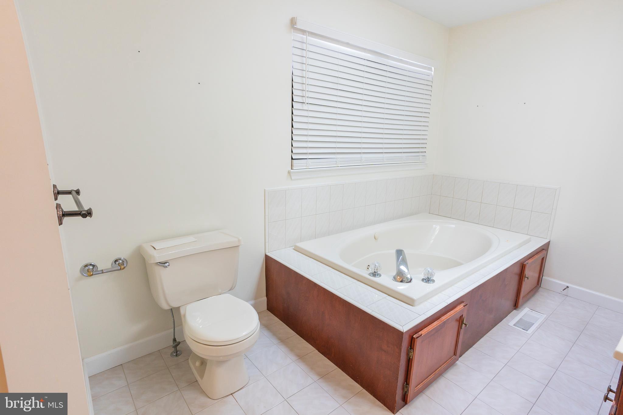 6 Overview Court Reading, PA 19607 - Photo 38 of 69 a bathroom with a bath tub a toilet and a sink