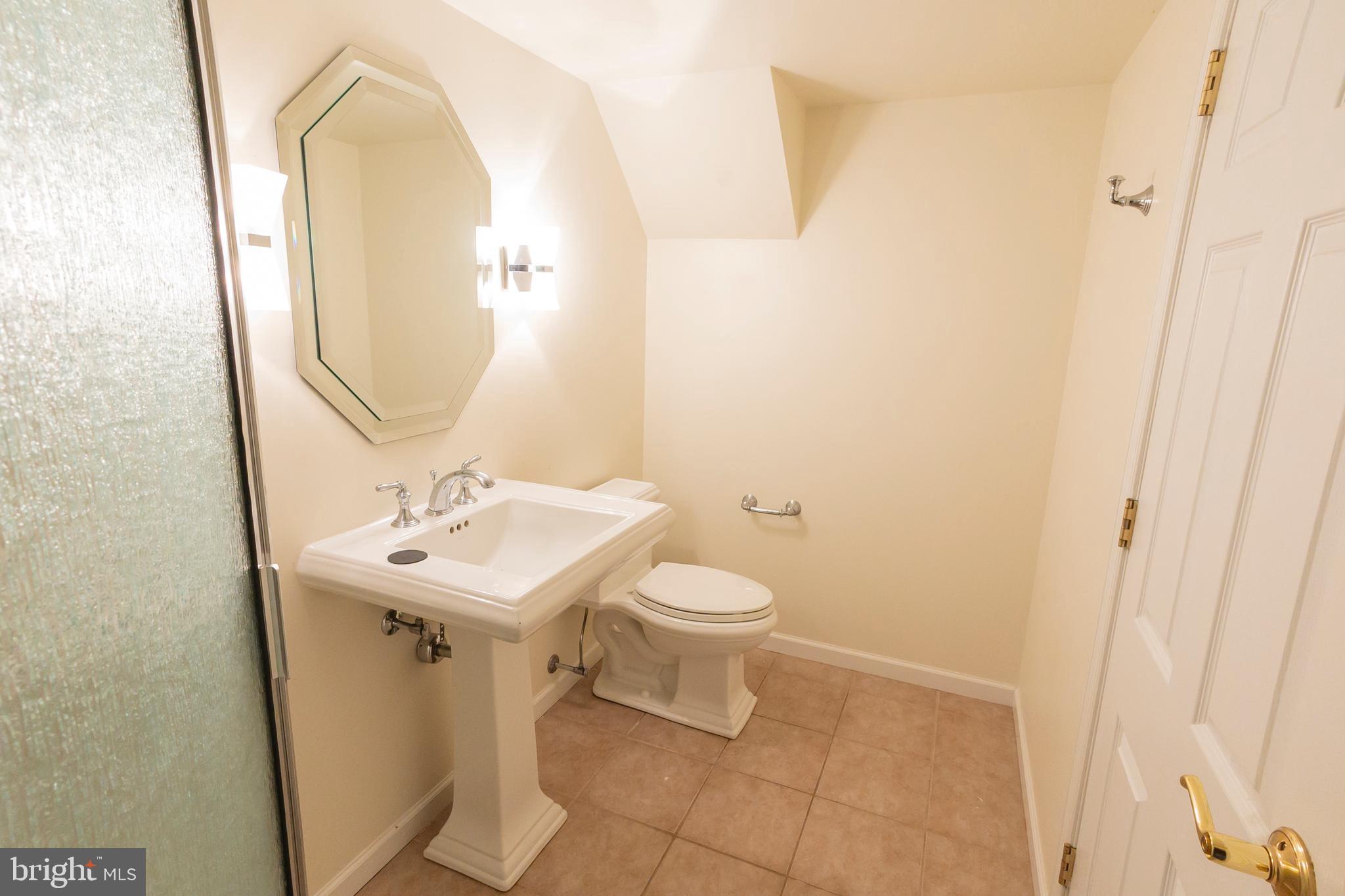 6 Overview Court Reading, PA 19607 - Photo 52 of 69 a bathroom with a toilet a sink and a mirror