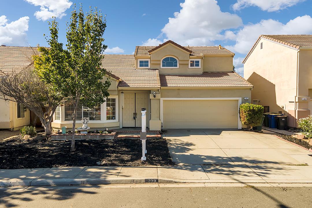 239 Balboa Drive Milpitas, CA 95035 - Photo 1 of 57 a front view of a house with a yard