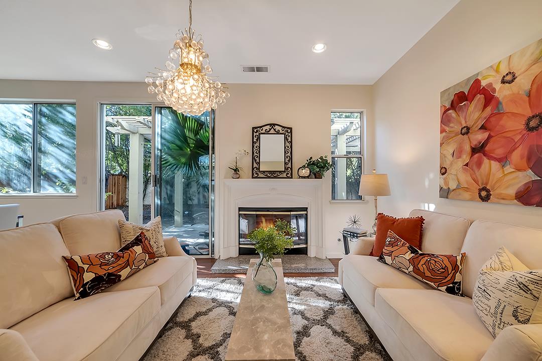 239 Balboa Drive Milpitas, CA 95035 - Photo 23 of 57 a living room with furniture and a fireplace
