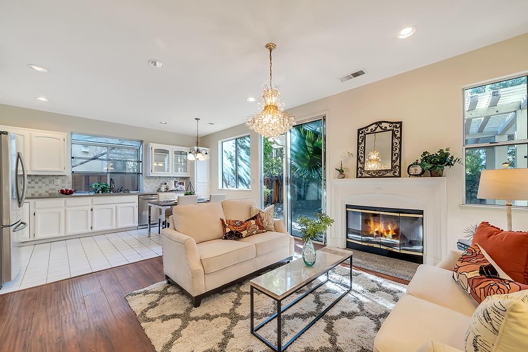 239 Balboa Drive Milpitas, CA 95035 - Photo 24 of 57 a living room with furniture and a fireplace