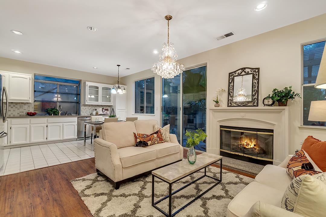 239 Balboa Drive Milpitas, CA 95035 - Photo 26 of 57 a living room with furniture and a fireplace