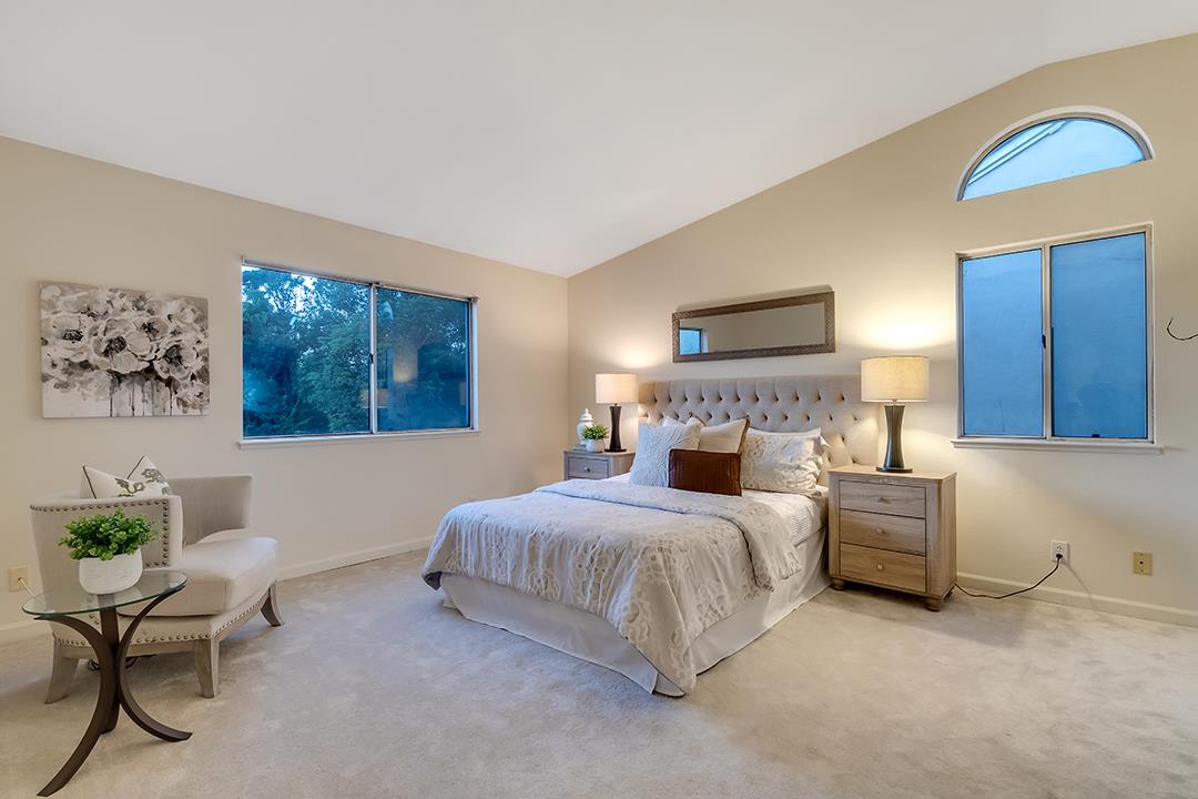 239 Balboa Drive Milpitas, CA 95035 - Photo 28 of 57 a bedroom with a bed and a couch