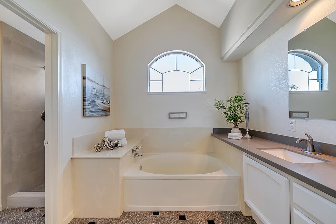 239 Balboa Drive Milpitas, CA 95035 - Photo 30 of 57 a bathroom with a sink and a mirror