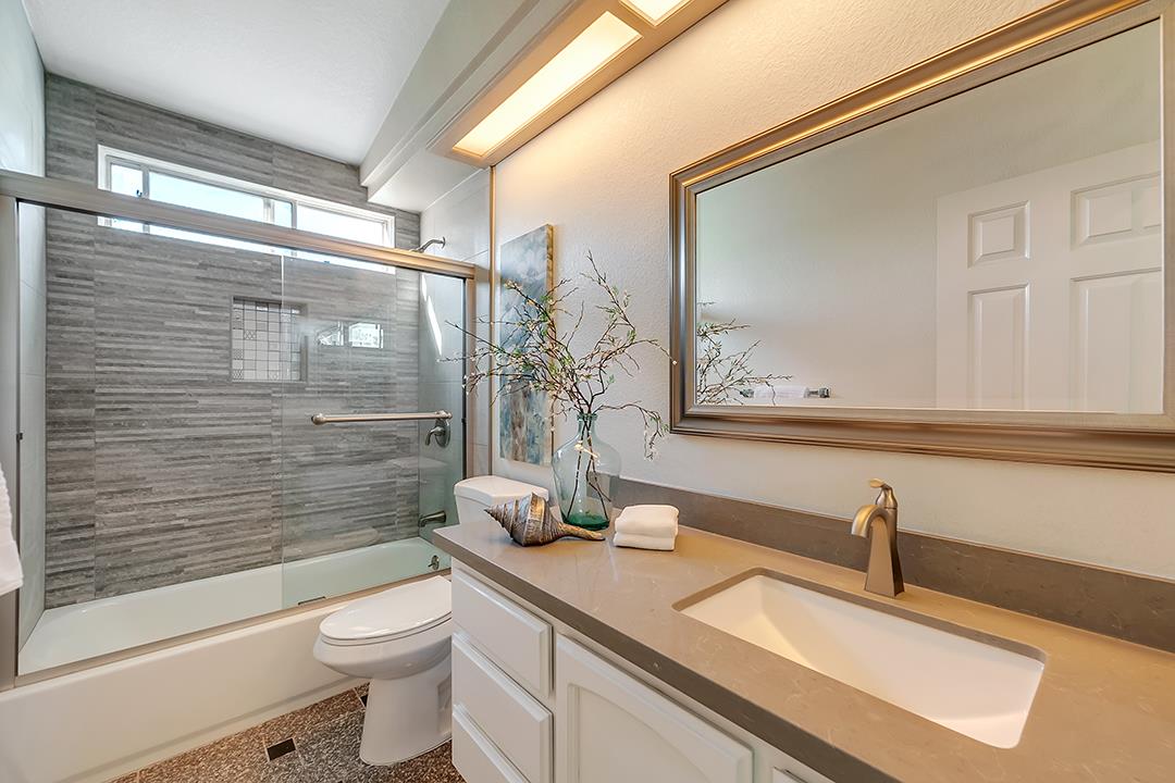 239 Balboa Drive Milpitas, CA 95035 - Photo 33 of 57 a bathroom with a sink a toilet and shower