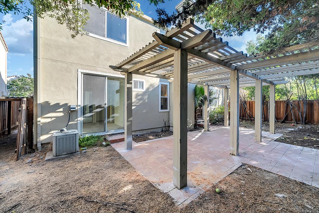 239 Balboa Drive Milpitas, CA 95035 - Photo 43 of 57 a view of a patio with table and chairs and potted plants