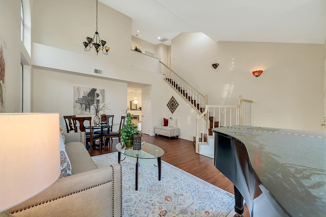 239 Balboa Drive Milpitas, CA 95035 - Photo 6 of 57 a living room with furniture and wooden floor