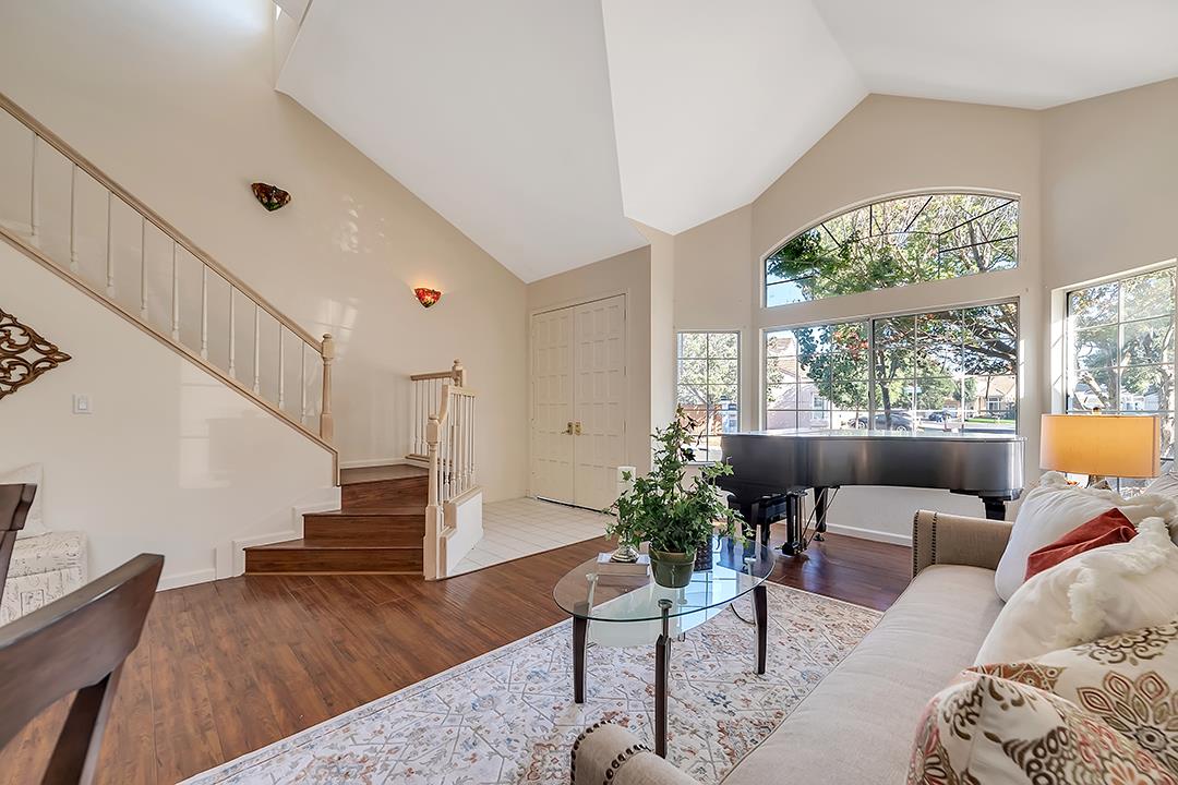 239 Balboa Drive Milpitas, CA 95035 - Photo 8 of 57 a living room with furniture and a large window