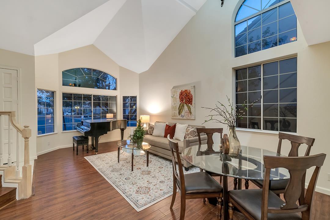 239 Balboa Drive Milpitas, CA 95035 - Photo 10 of 57 a living room with furniture and a floor to ceiling window