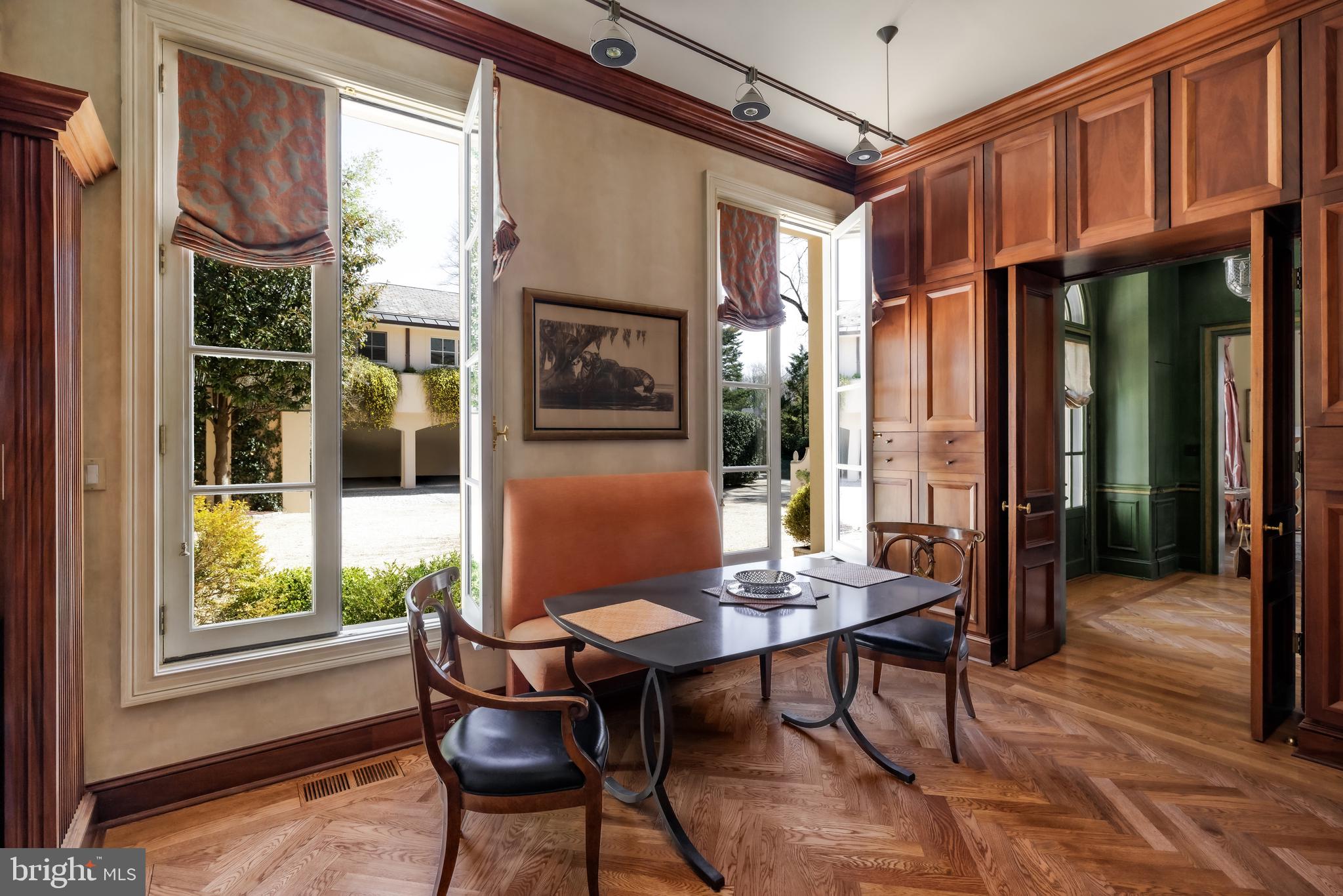 2740 Chain Bridge Road Northwest Washington, DC 20016 - Photo 15 of 50 a outdoor dining space with furniture and front door