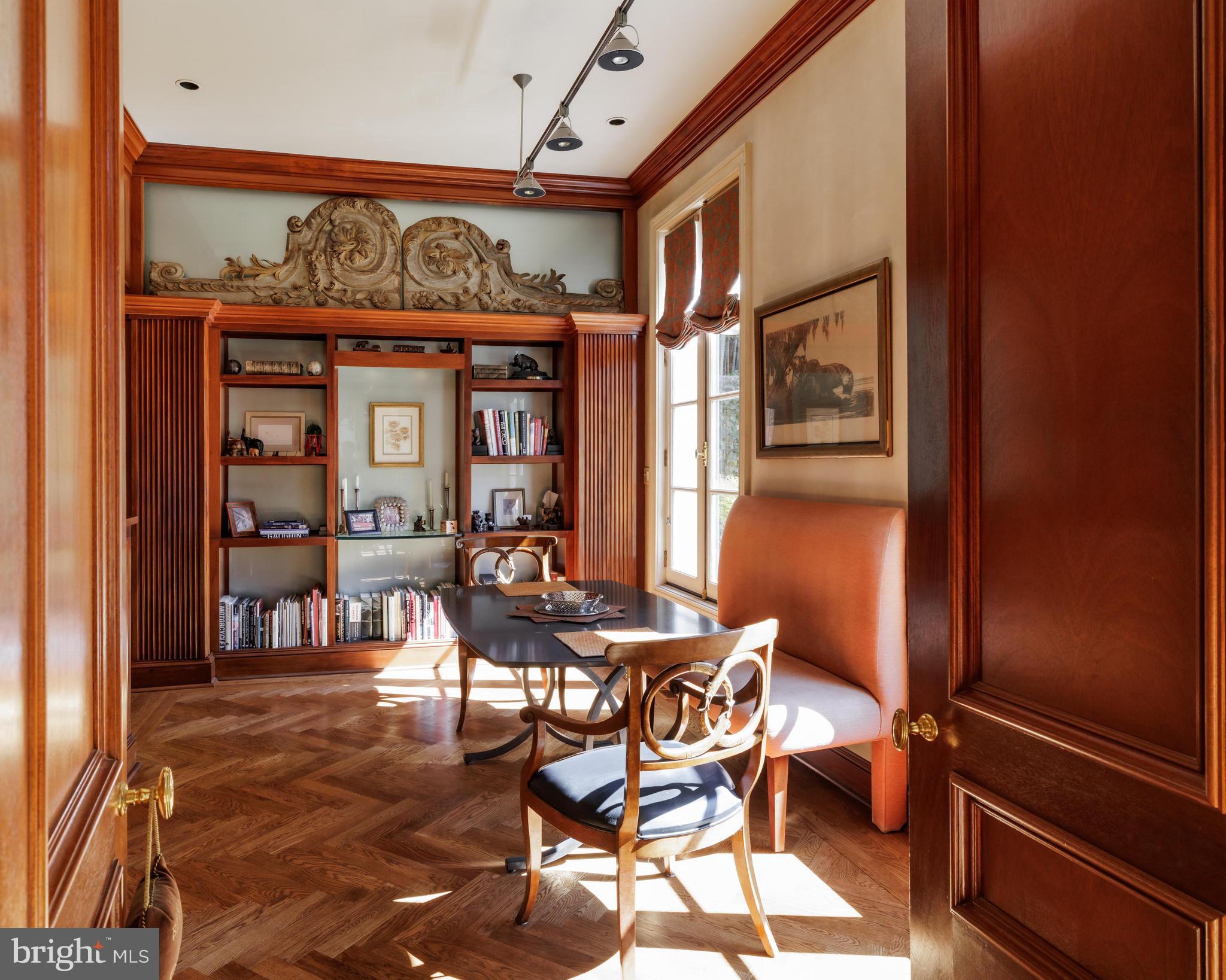 2740 Chain Bridge Road Northwest Washington, DC 20016 - Photo 16 of 50 a view of a dining room with furniture and a chandelier
